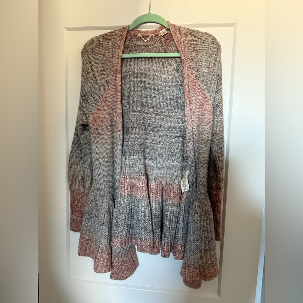 Knitted & Knotted peplum cardigan sweater